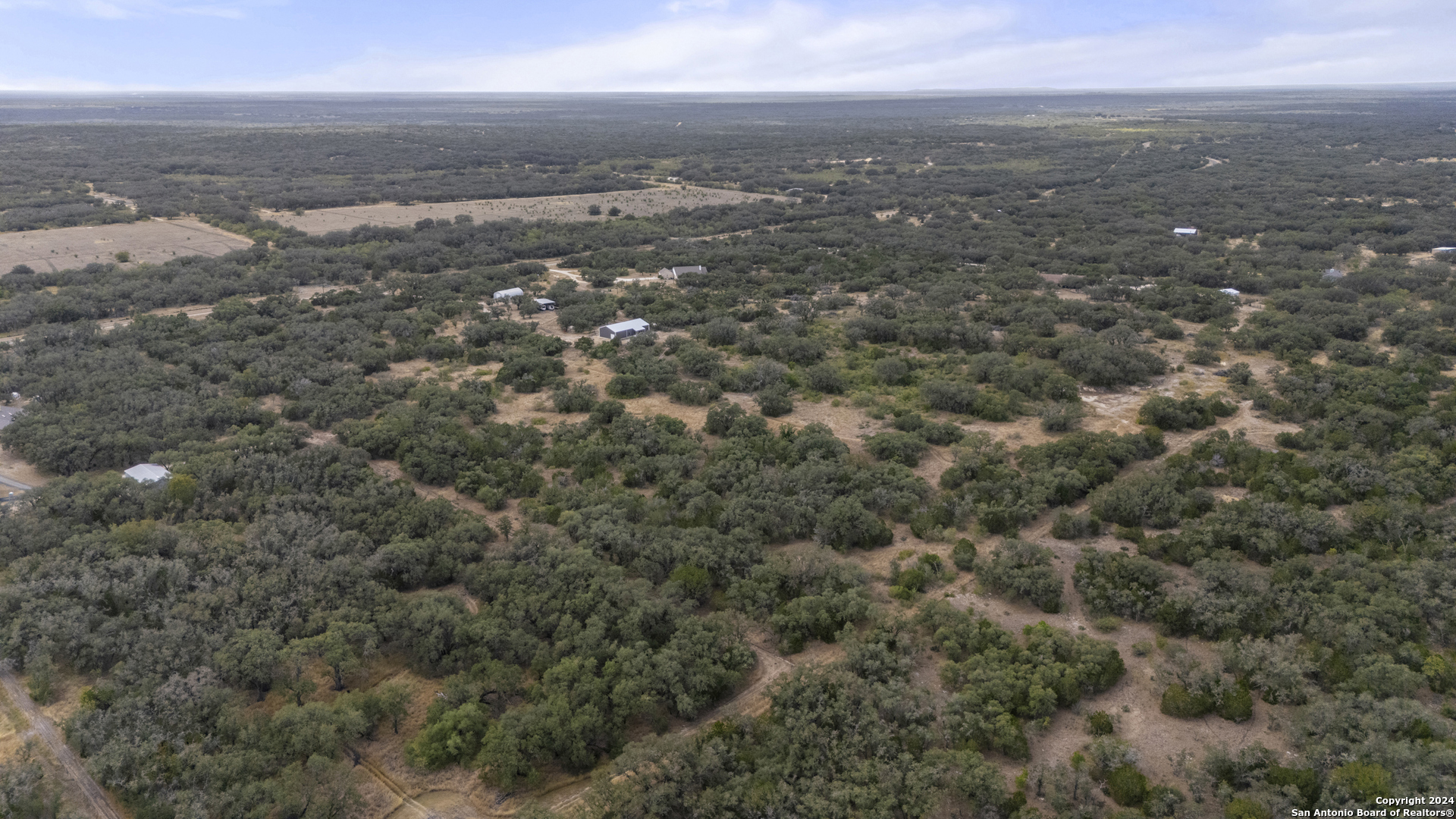 0 Fm 1796 D'Hanis, TX 78850 - Photo 7 of 30 an aerial view of residential houses with outdoor space