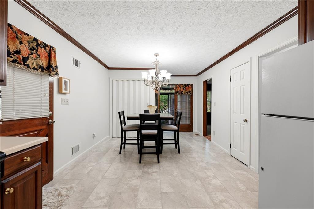 3121 Bonds Lake Road Northwest Conyers, GA 30012 - Photo 13 of 36 a view of a hallway with seating area