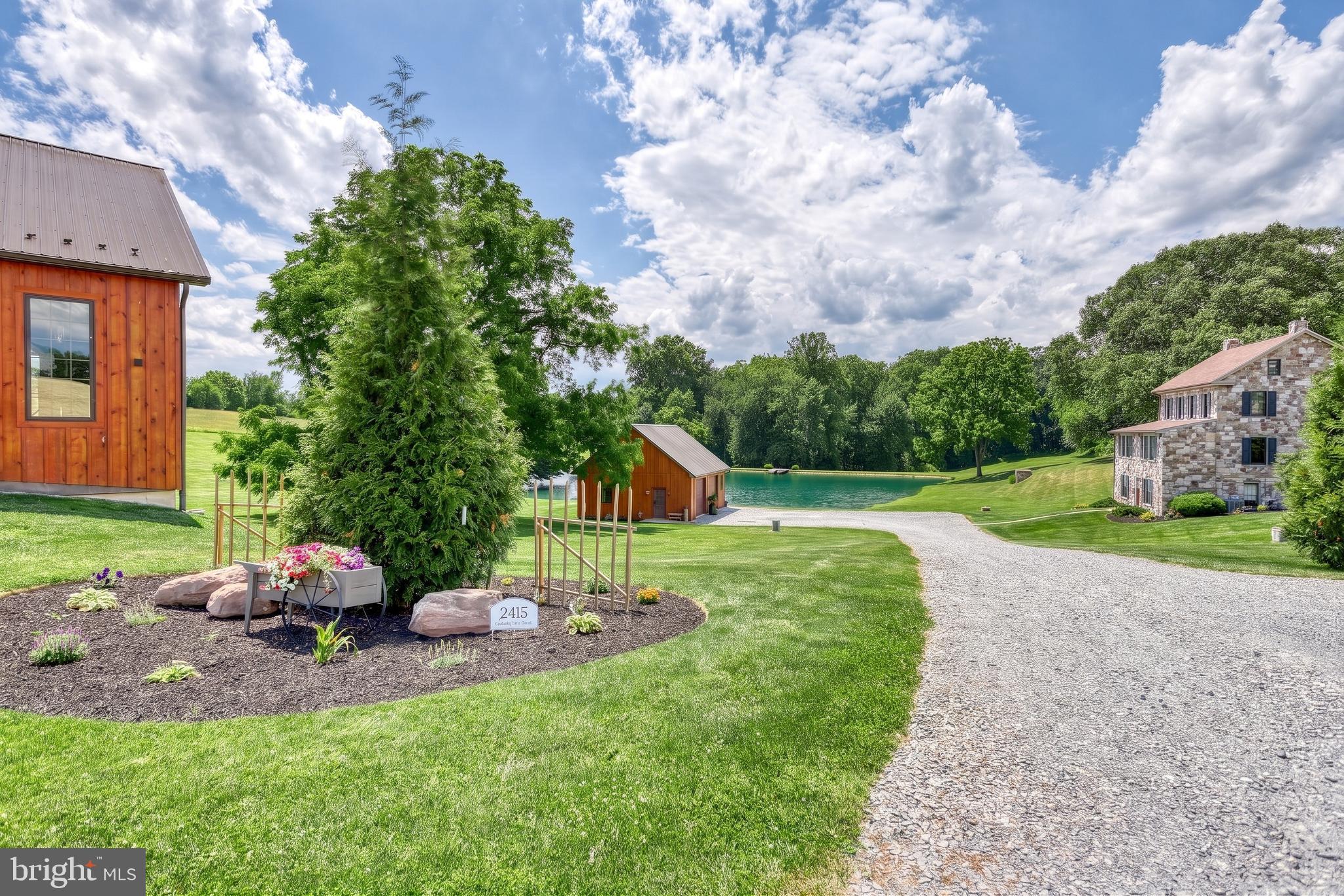 2415 Clearview Lane Spring Grove, PA 17362 - Photo 57 of 149 a backyard of a house with table and chairs