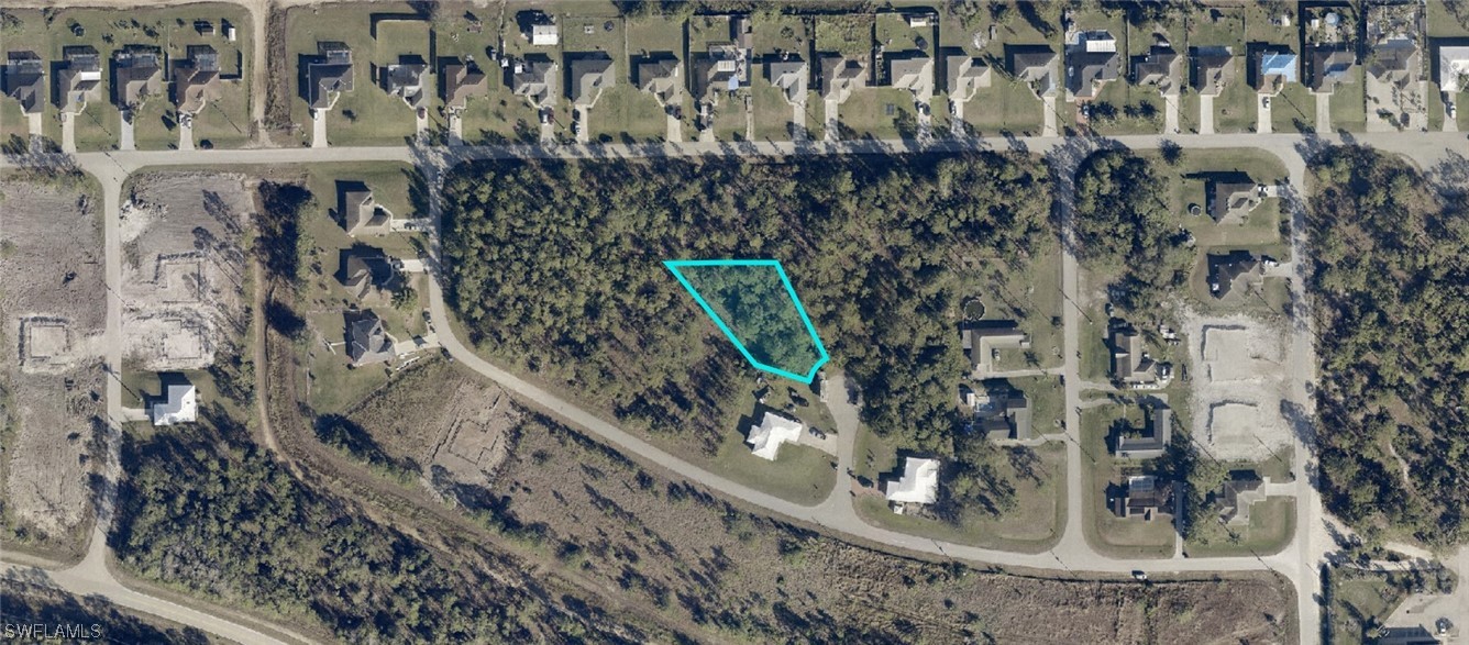 2011 Raber Court Lehigh Acres, FL 33972 - Photo 4 of 5 a bird view of building