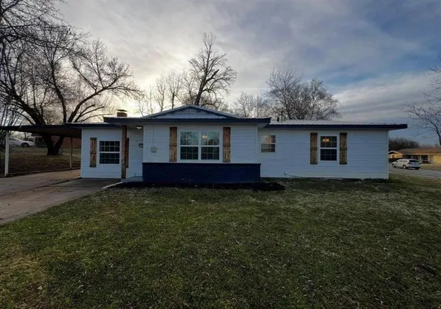 a house view with a garden space