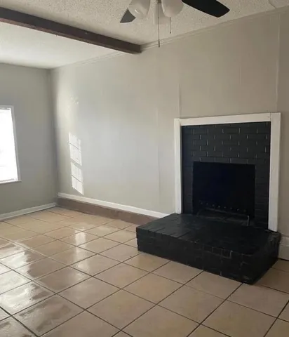 a living room with a fireplace