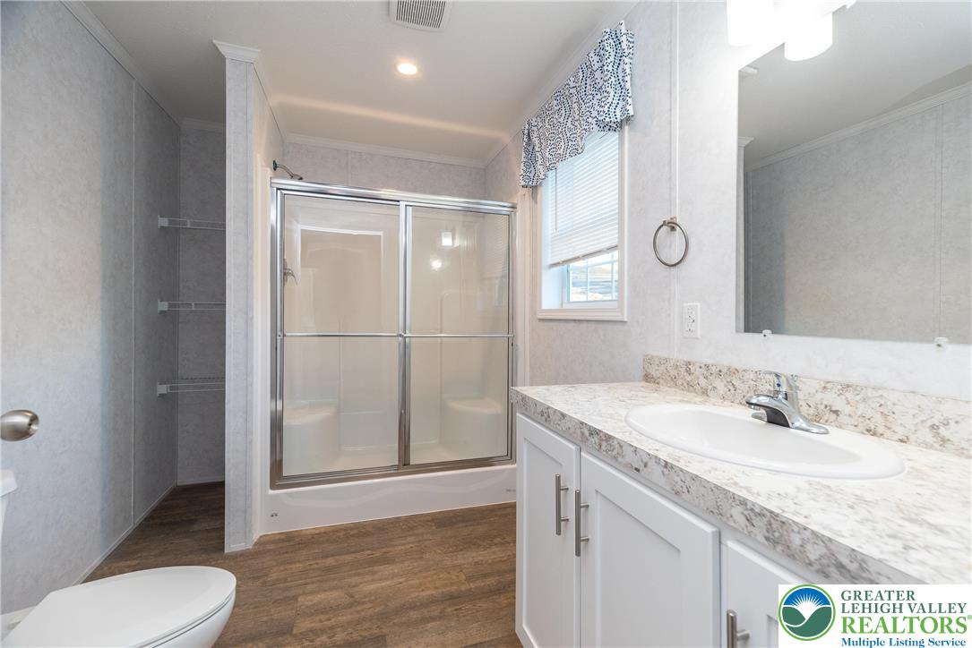 465 Royal Manor Road, Unit LOT 8 Easton, PA 18042 - Photo 11 of 23 a bathroom with a sink a toilet and shower