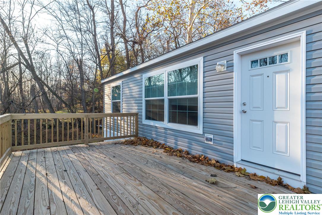 465 Royal Manor Road, Unit LOT 8 Easton, PA 18042 - Photo 19 of 23 a view of house with deck and wooden floor