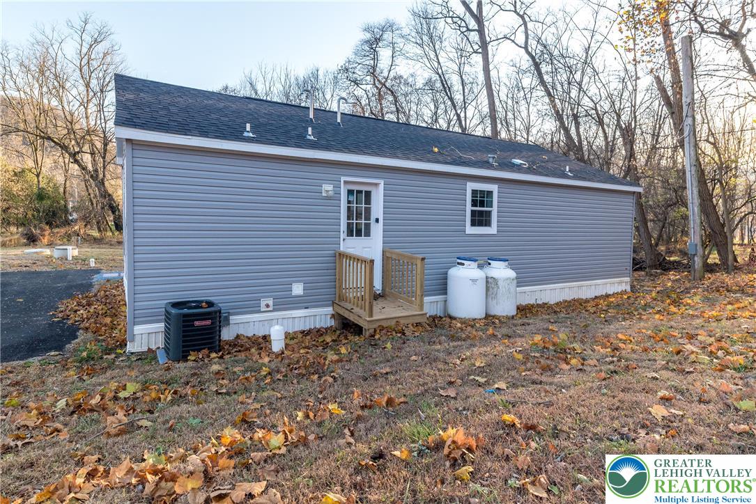 465 Royal Manor Road, Unit LOT 8 Easton, PA 18042 - Photo 20 of 23 a view of a house with a yard