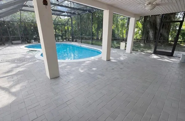 a view of a porch with wooden floor and outdoor space