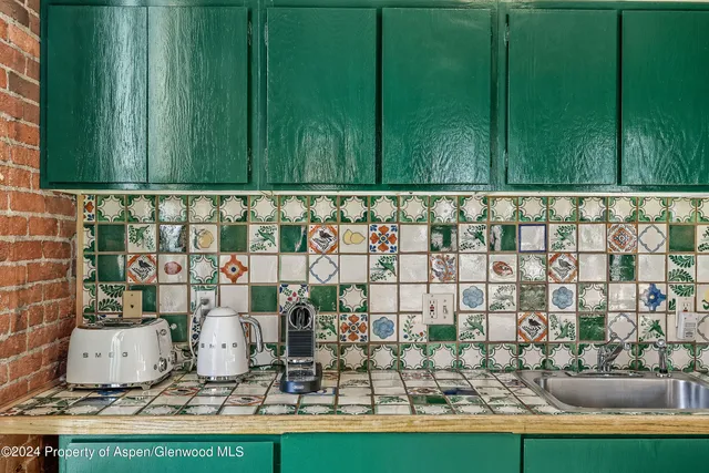 a view of sink and garden