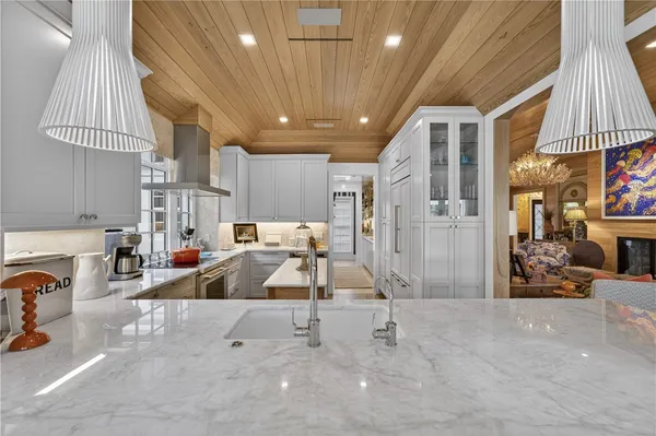 a view of a livingroom with furniture and a garage
