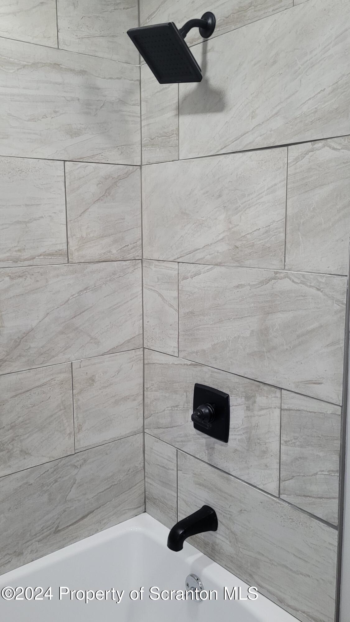 821 Mitchell Road Meshoppen, PA 18630 - Photo 27 of 58 a bathroom with a shower