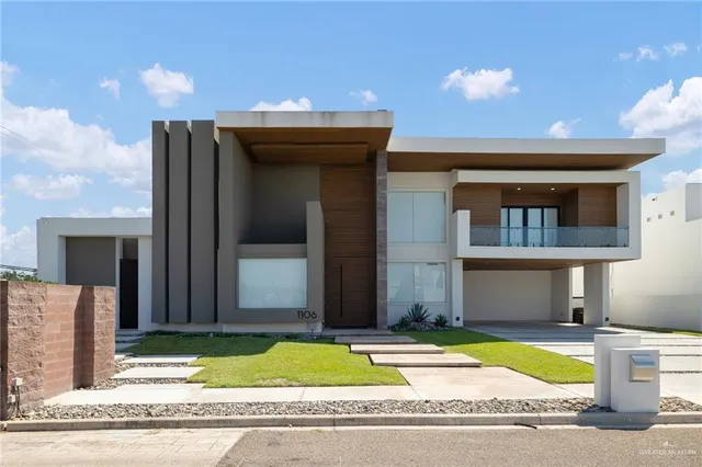 a view of a house with a patio