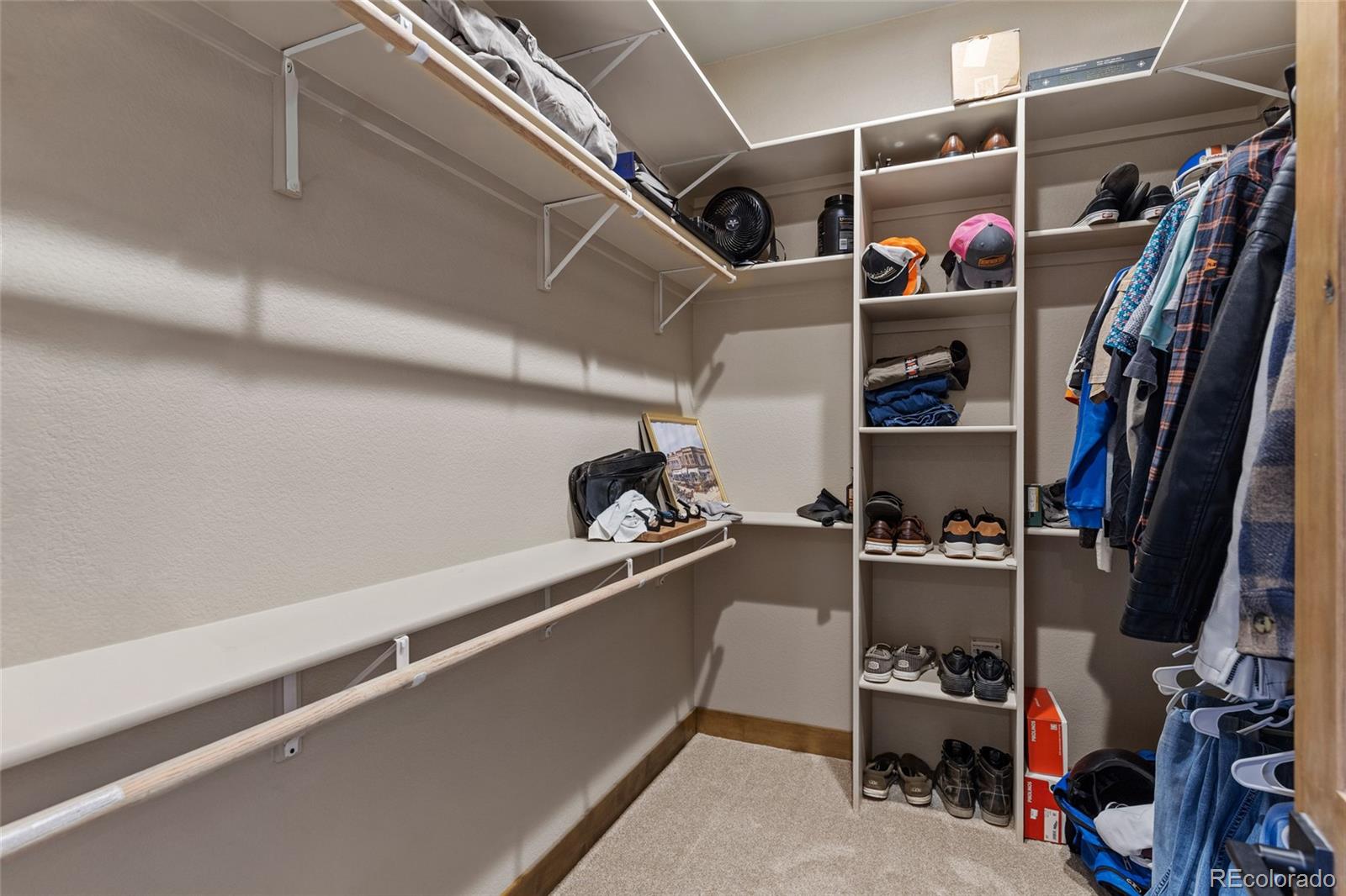 903 Liptrap Street Simla, CO 80835 - Photo 15 of 37 a view of walk in closet with clothes and shoes