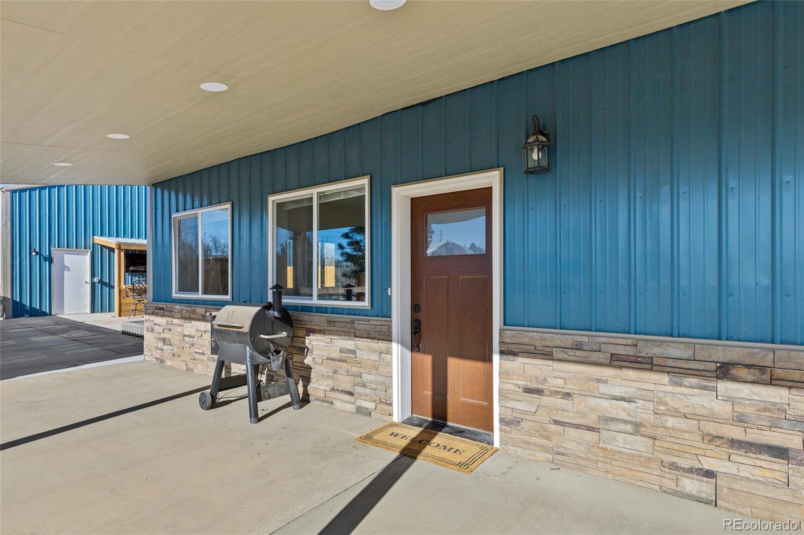 903 Liptrap Street Simla, CO 80835 - Photo 3 of 37 an entryway at livingroom with furniture and wooden floor
