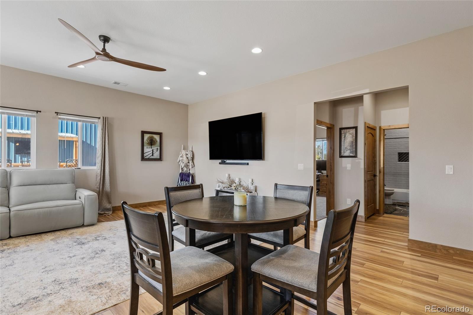 903 Liptrap Street Simla, CO 80835 - Photo 8 of 37 a view of a dining room with furniture and wooden floor
