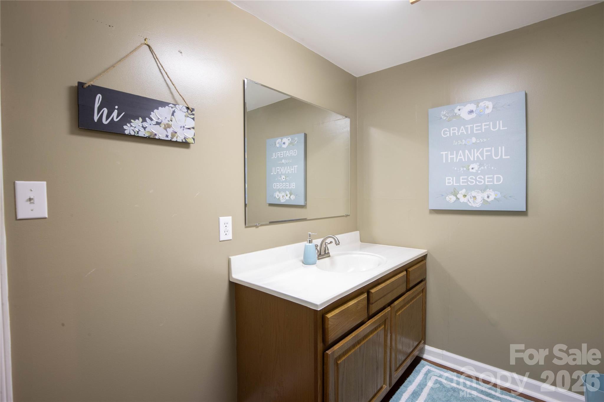 84 Sheets Farm Road Bakersville, NC 28705 - Photo 38 of 42 a bathroom with a sink and a mirror
