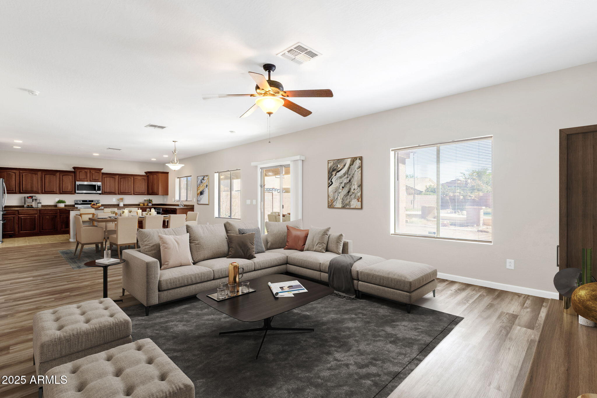 43003 West Magnolia Road Maricopa, AZ 85138 - Photo 1 of 32 a living room with furniture or couch and a window