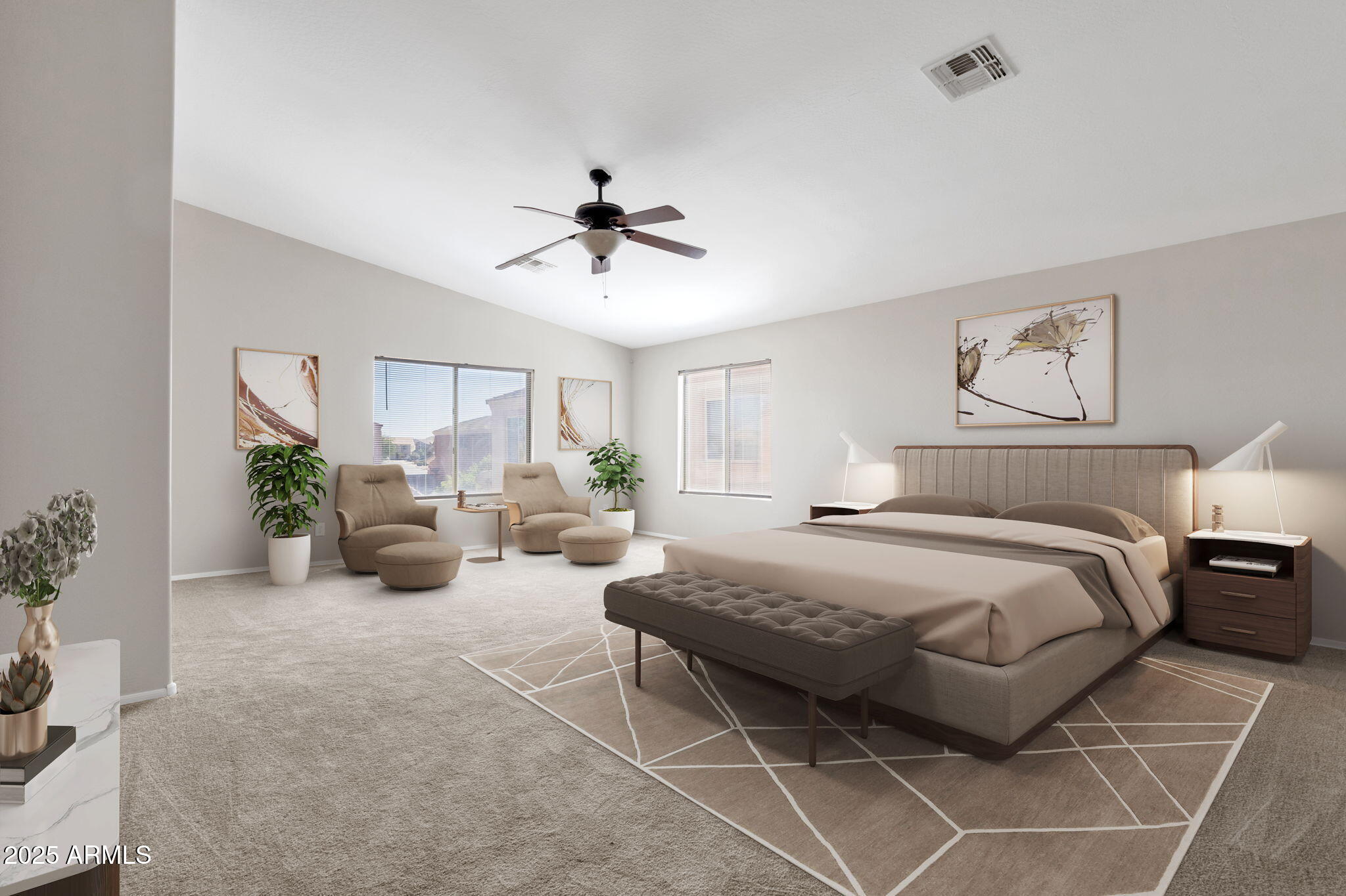 43003 West Magnolia Road Maricopa, AZ 85138 - Photo 5 of 32 a spacious bedroom with a bed a couch and potted plant