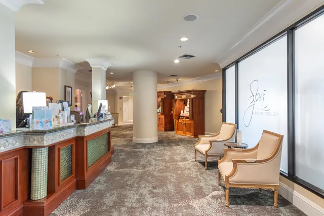 a view of a swimming pool with a lounge chair