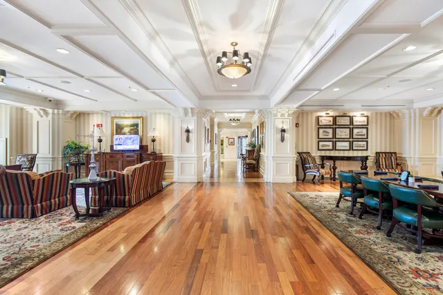 a view of a swimming pool with a lounge chair