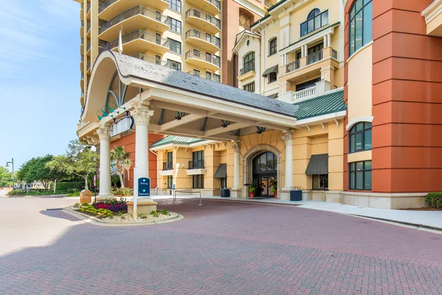 a view of a street with stores
