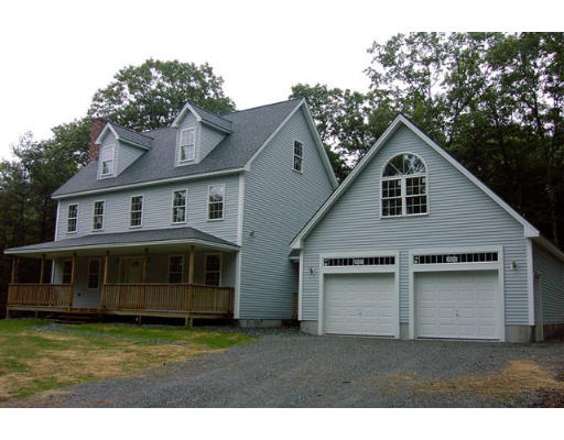 262 Hastings Road Ashburnham, MA 01430 - Photo 1 of 10 a front view of a house with a garden