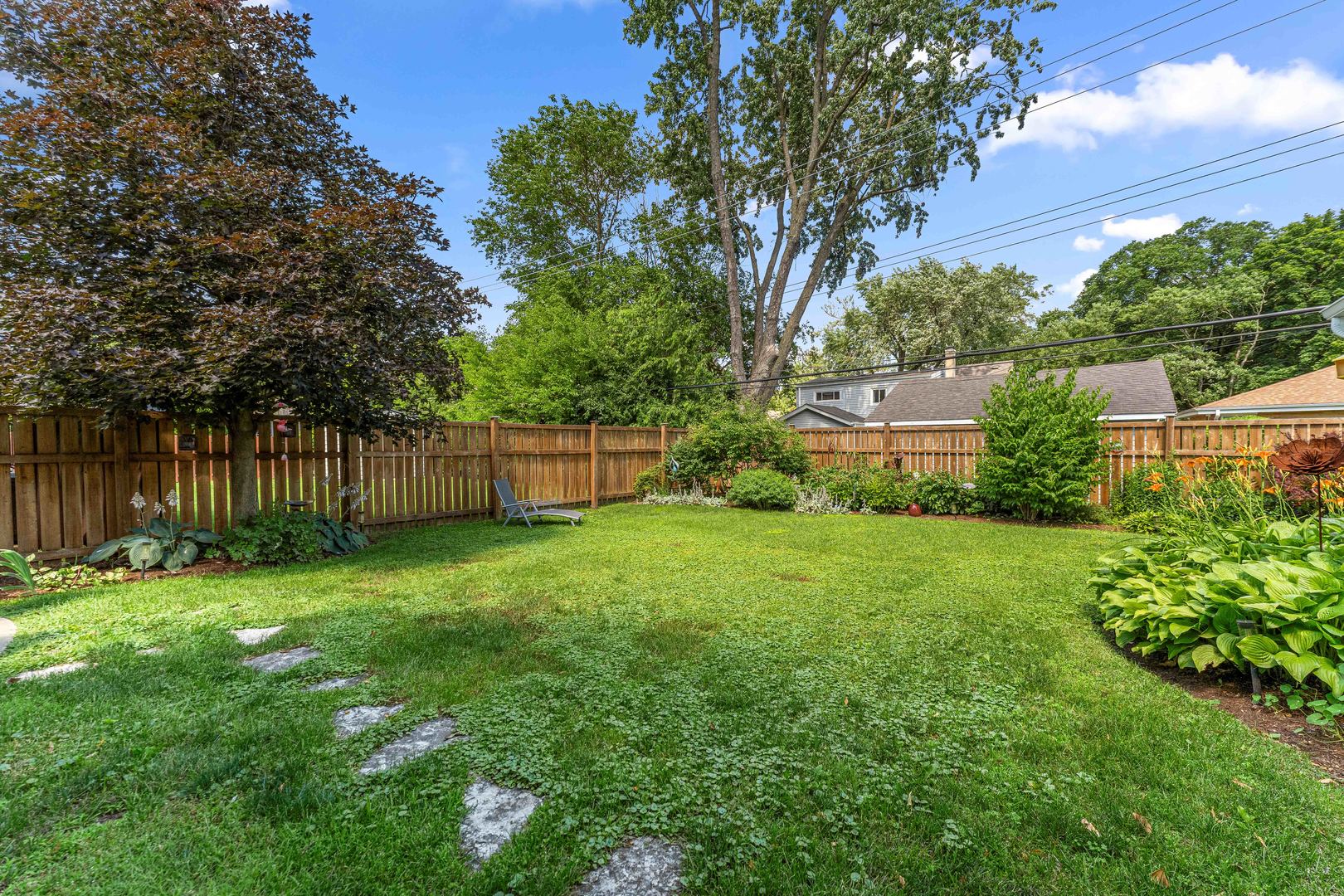 725 North County Line Road Hinsdale, IL 60521 - Photo 26 of 34 a view of a backyard with a garden