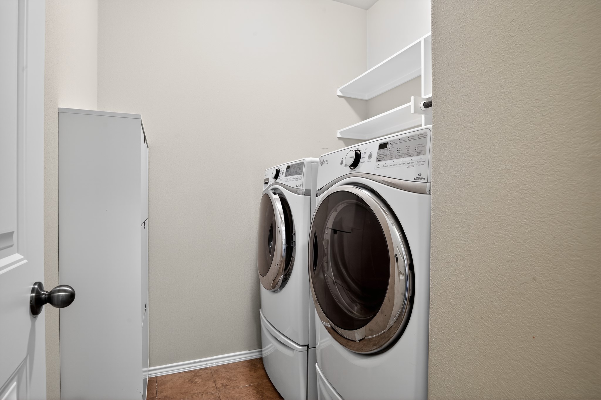 16816 Ruggio Road Pflugerville, TX 78660 - Photo 12 of 30 Washer/dryer convey. Laundry room located downstairs.