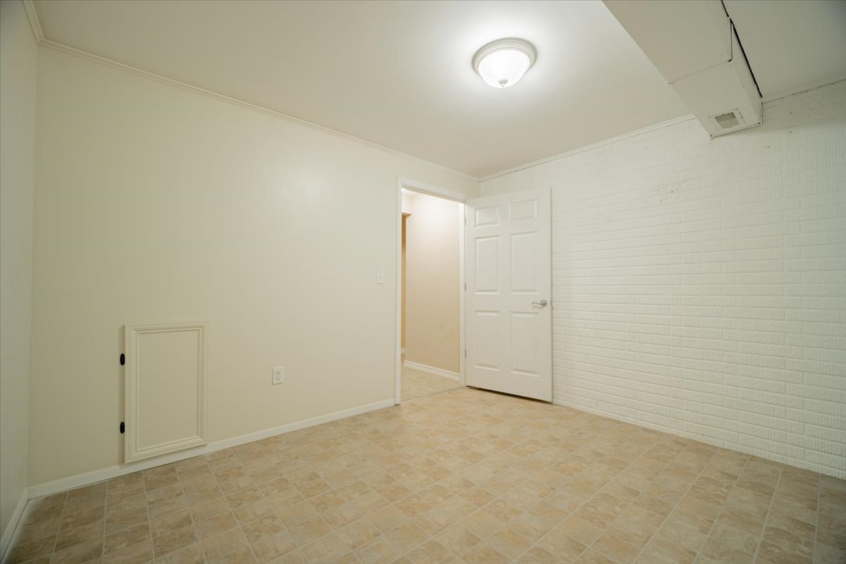 2885 East Raab Road Normal, IL 61761 - Photo 23 of 35 an empty room with an entryway