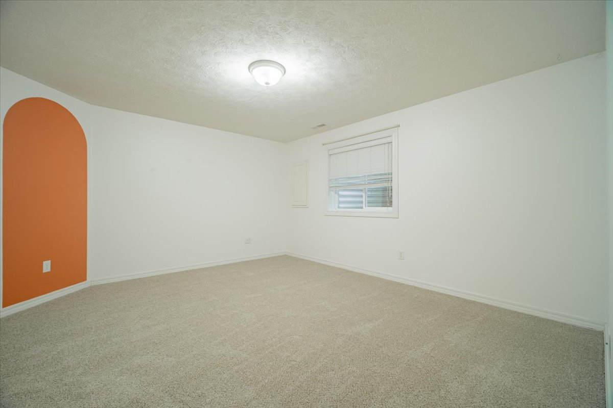 2885 East Raab Road Normal, IL 61761 - Photo 26 of 35 an empty room with a empty space and windows