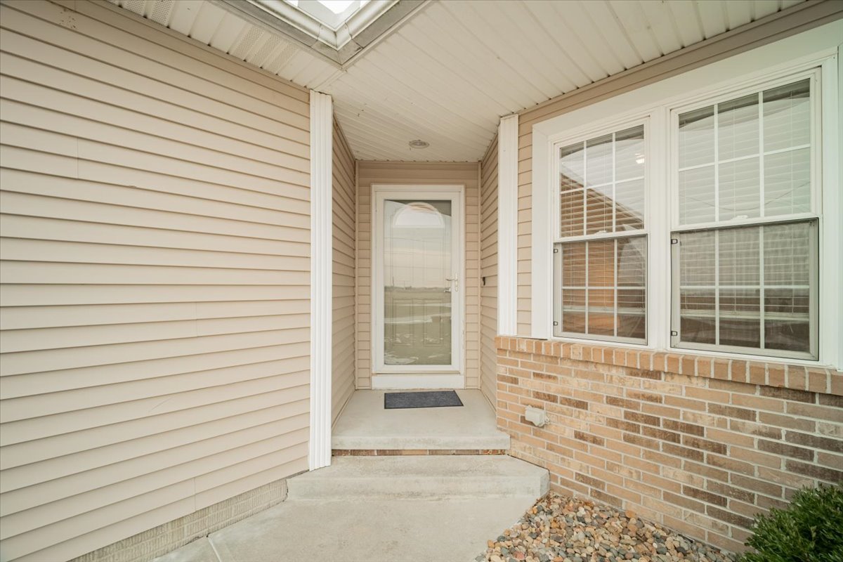 2885 East Raab Road Normal, IL 61761 - Photo 4 of 35 a view of a door and a window