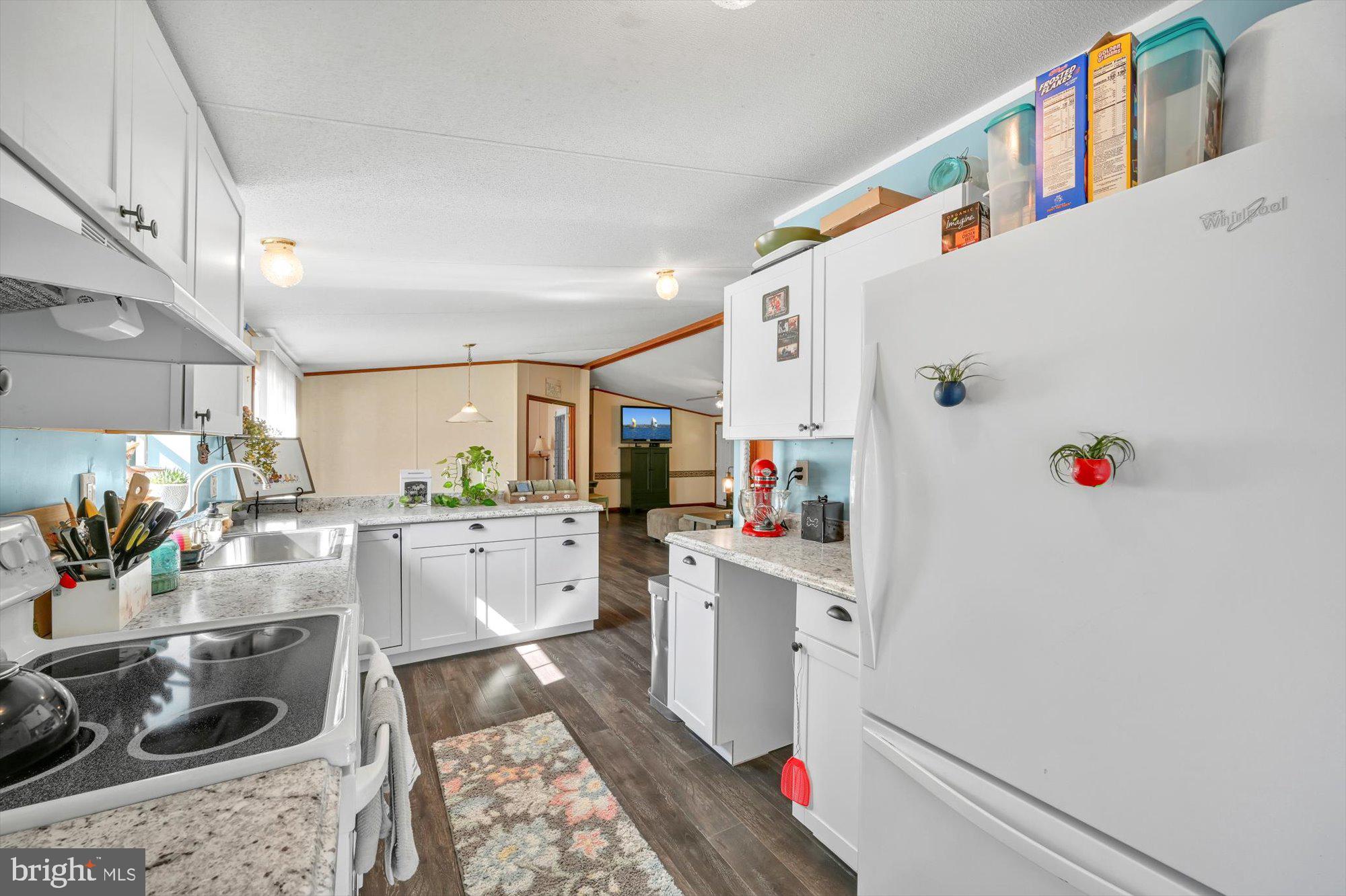 789 Hoffmeier Road Gap, PA 17527 - Photo 12 of 26 a kitchen with white cabinets and white appliances