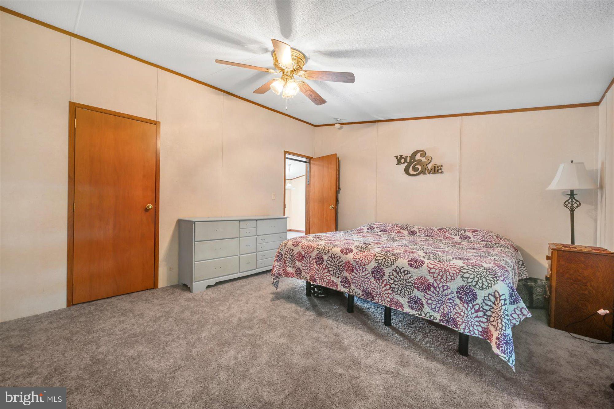 789 Hoffmeier Road Gap, PA 17527 - Photo 16 of 26 a bedroom with a bed and a chandelier