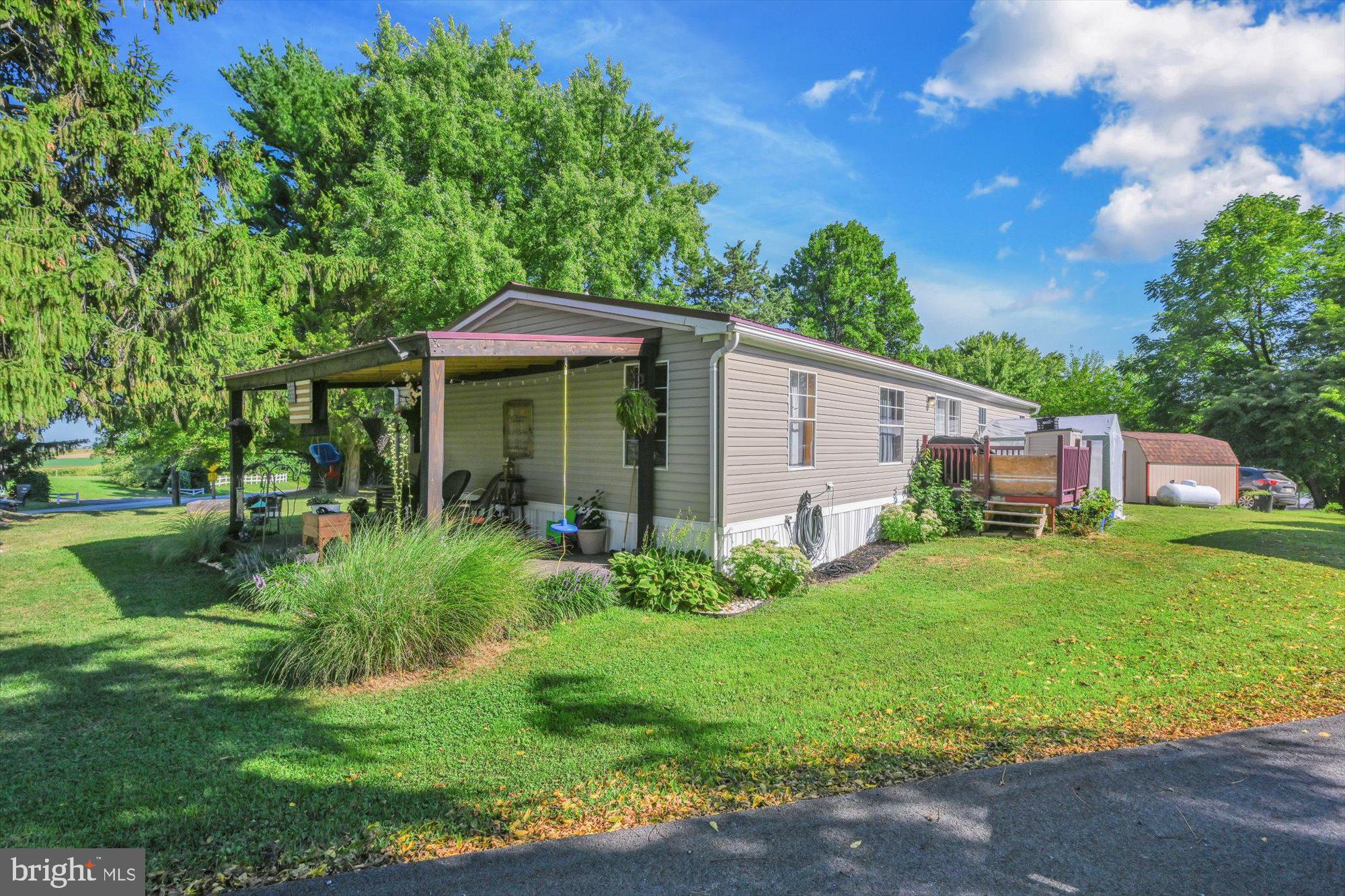789 Hoffmeier Road Gap, PA 17527 - Photo 24 of 26 a front view of a house with garden