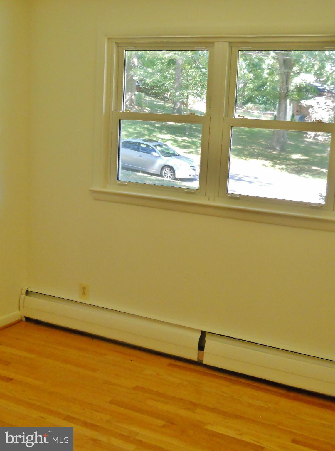 7930 Belgaro Road Laurel, MD 20723 - Photo 22 of 30 3rd Bedroom w/ Hardwood Floor
