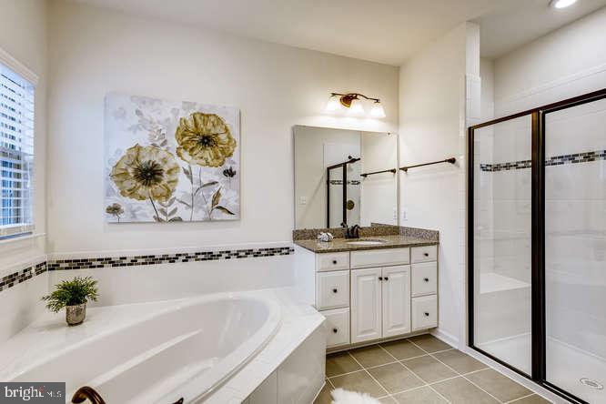823 Orchard Tree Road, Unit 49 Odenton, MD 21113 - Photo 16 of 28 Granite Counters, Upgraded Tile & Fixtures
