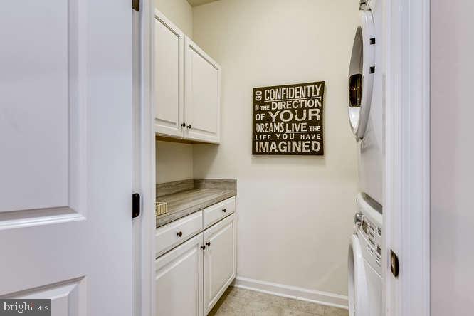 823 Orchard Tree Road, Unit 49 Odenton, MD 21113 - Photo 17 of 28 Laundry room w upgraded cabinets & Front Load W&D