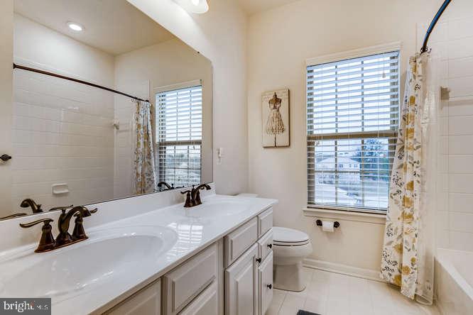 823 Orchard Tree Road, Unit 49 Odenton, MD 21113 - Photo 18 of 28 Upgraded Hall Bath vanity, tile & fixtures
