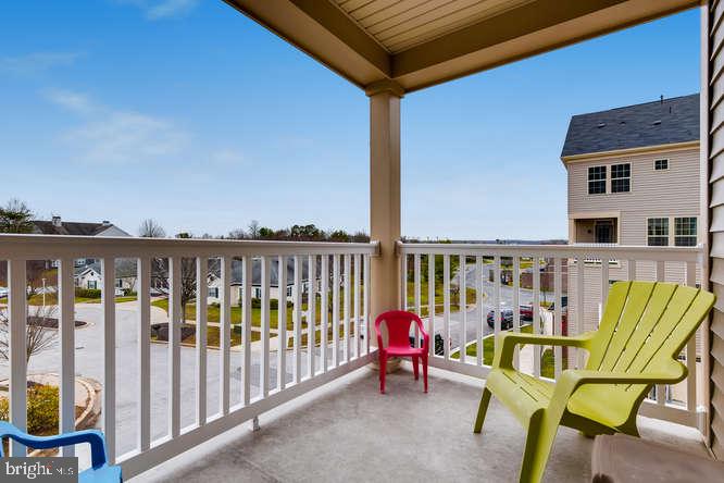823 Orchard Tree Road, Unit 49 Odenton, MD 21113 - Photo 24 of 28 Covered Deck w/ Lots of light.