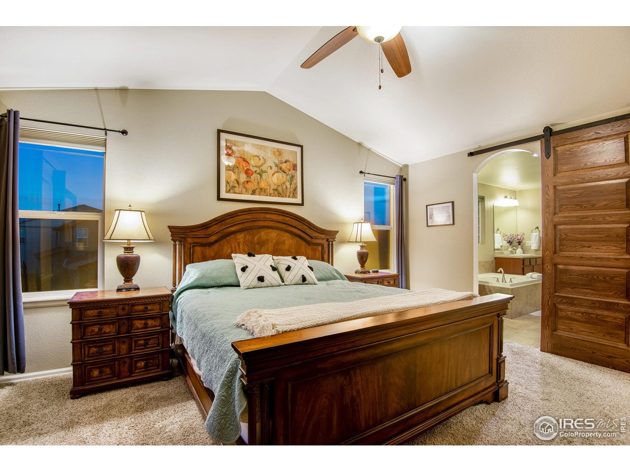 5762 Graphite Street Timnath, CO 80547 - Photo 20 of 27 a bedroom with a bed and a dresser