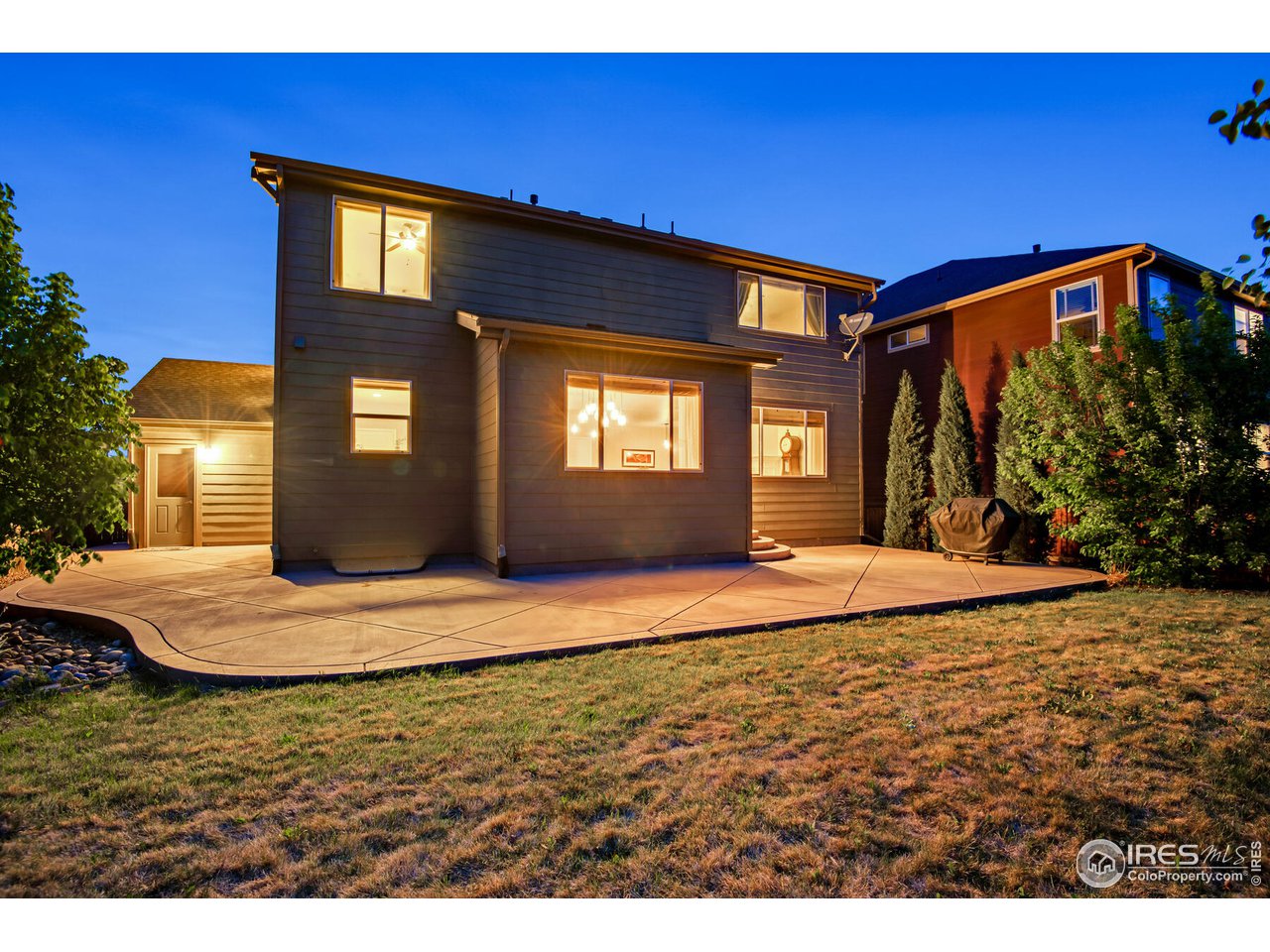 5762 Graphite Street Timnath, CO 80547 - Photo 3 of 27 a front view of a house with a yard