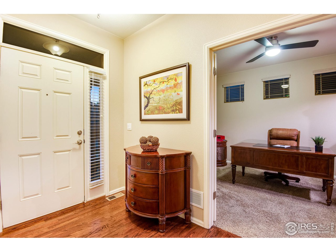 5762 Graphite Street Timnath, CO 80547 - Photo 6 of 27 a living room with furniture and a table