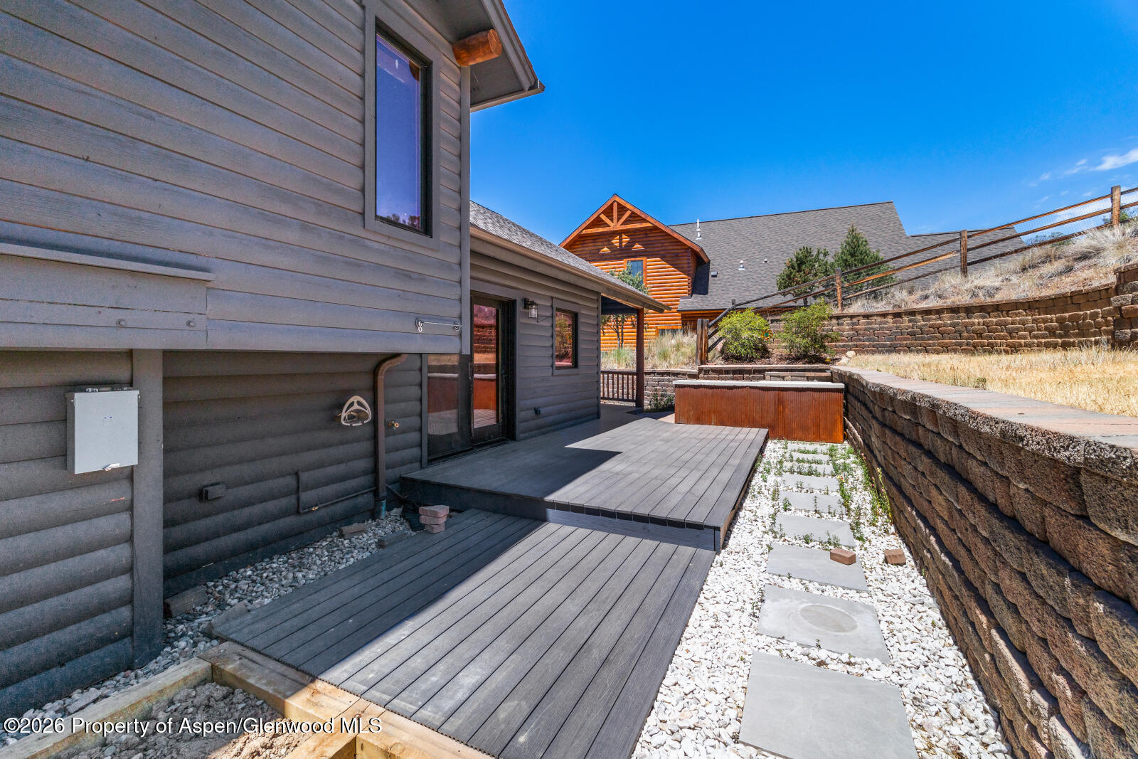 316 Faas Ranch Road New Castle, CO 81647 - Photo 42 of 50 a view of a balcony with wooden floor and outdoor seating