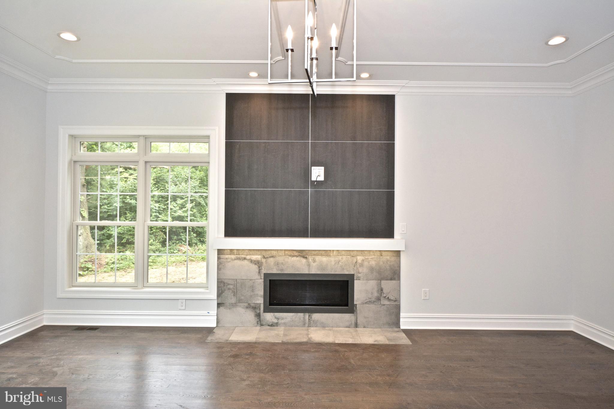 148 Herrontown Road Princeton, NJ 08540 - Photo 13 of 37 Family room fireplace cable ready.