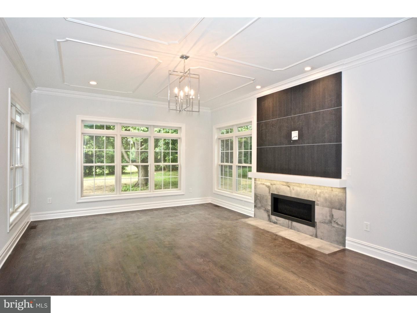 148 Herrontown Road Princeton, NJ 08540 - Photo 3 of 37 Family Room with fireplace & ceiling moldings.