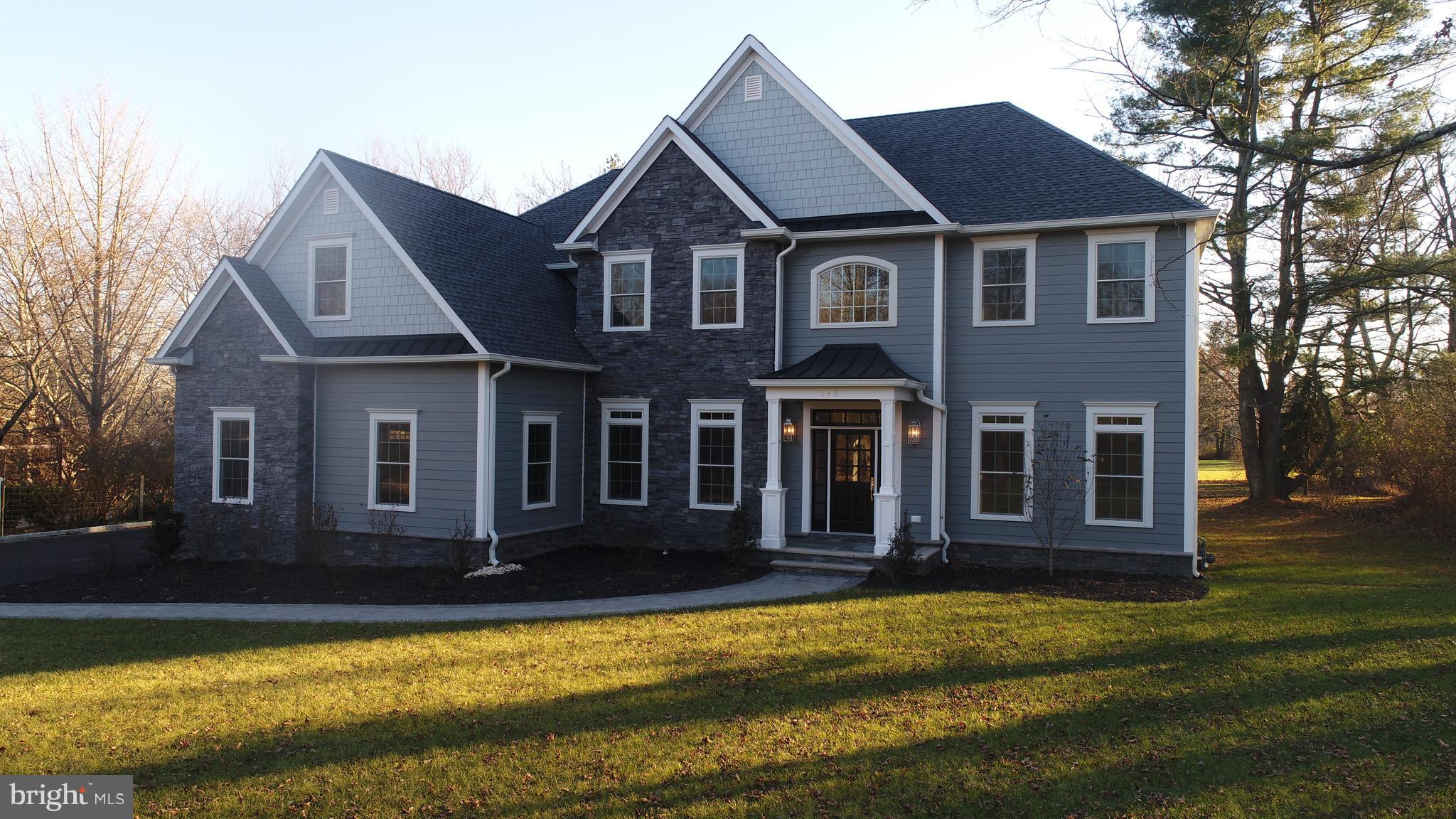 148 Herrontown Road Princeton, NJ 08540 - Photo 35 of 37 Sunset photo of front of house.