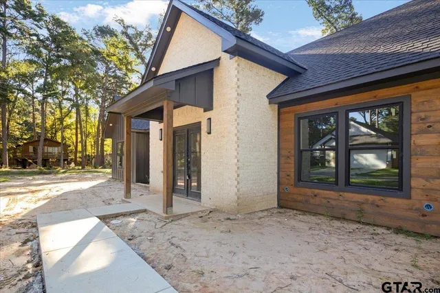 a front view of a house with a porch