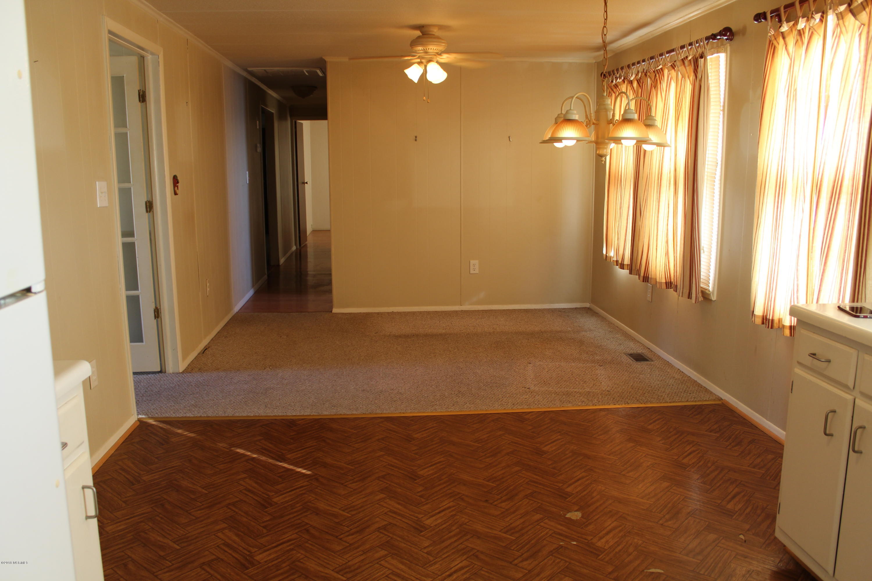 kitchen and dining combo with small sitting area adjacent. Great for entertaining.