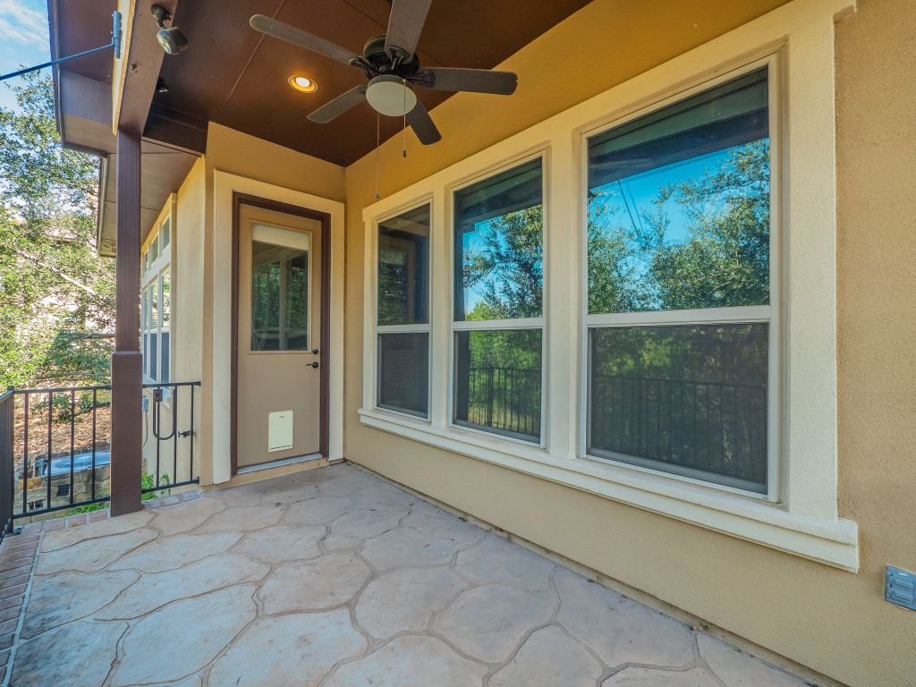 826 San Remo Boulevard Lakeway, TX 78734 - Photo 23 of 25 a view of entryway with a floor to ceiling window and ceiling fan