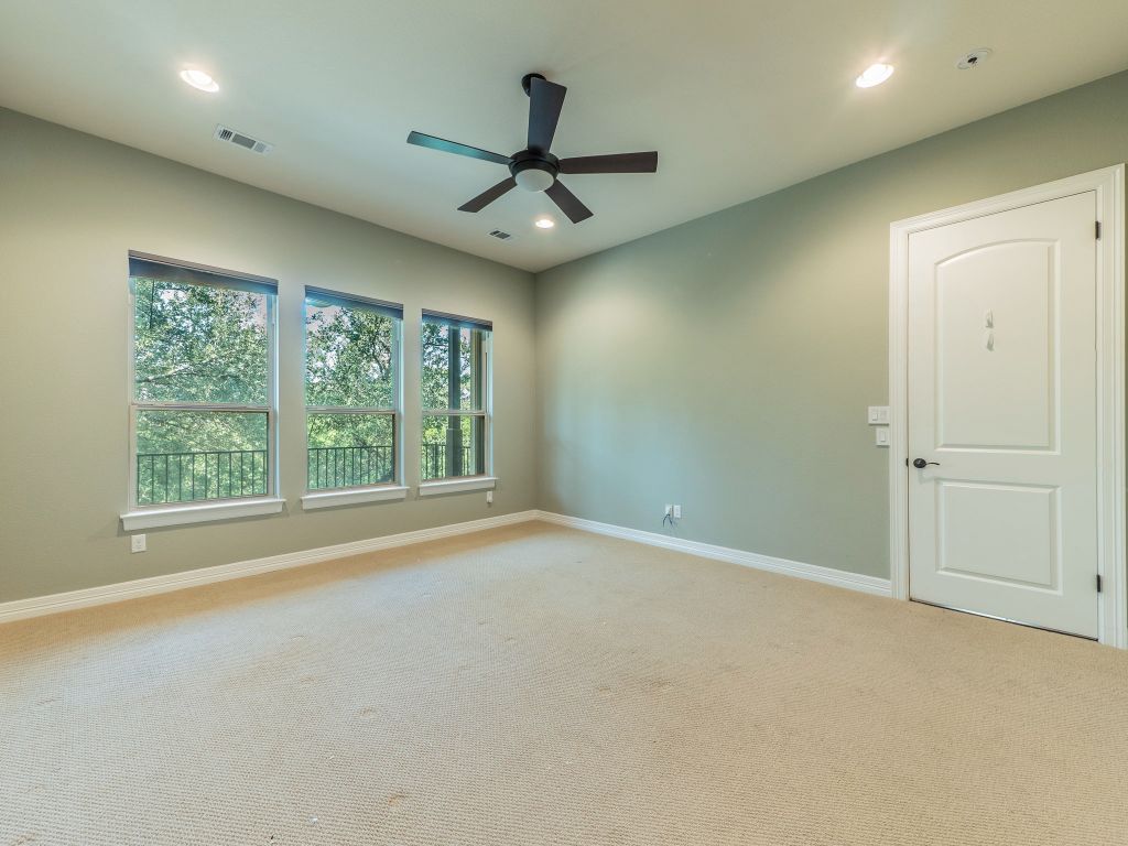 826 San Remo Boulevard Lakeway, TX 78734 - Photo 10 of 25 a view of an empty room with a window