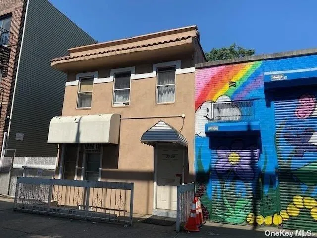 a front view of a house with balcony