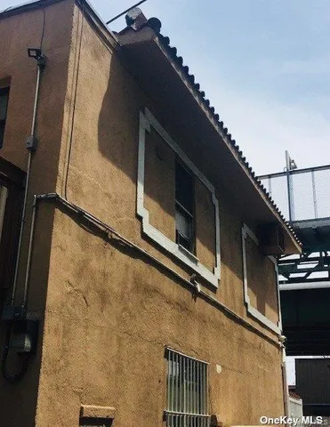 a view of building with cars